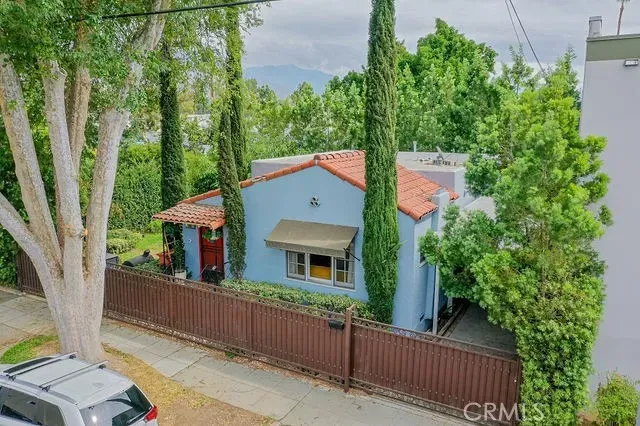 an aerial view of a residential apartment building with yard