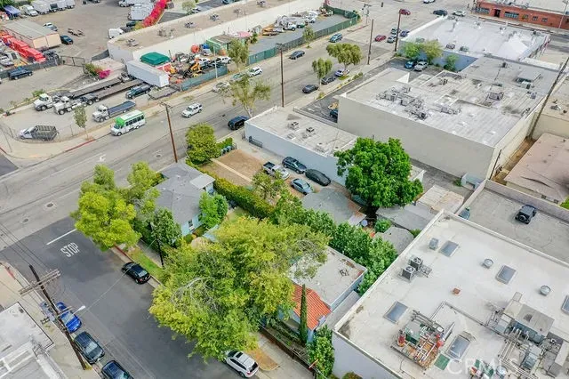 an aerial view of a house with outdoor space