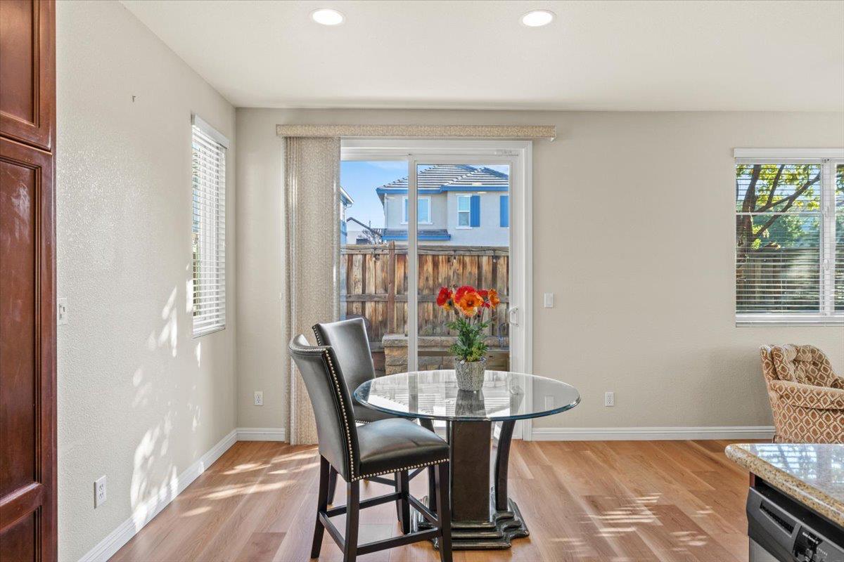 1000 Impressionist Loop Roseville, CA 95747 - Photo 12 of 33 a view of a dining room with furniture and a window