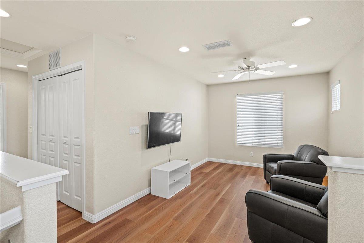 1000 Impressionist Loop Roseville, CA 95747 - Photo 17 of 33 a living room with furniture and a flat screen tv