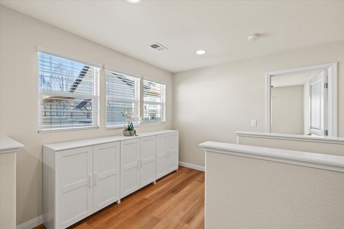 1000 Impressionist Loop Roseville, CA 95747 - Photo 19 of 33 a room with a bed and a large window