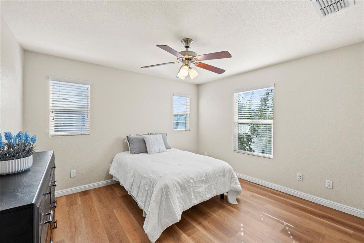 1000 Impressionist Loop Roseville, CA 95747 - Photo 22 of 33 a bedroom with a bed and a window