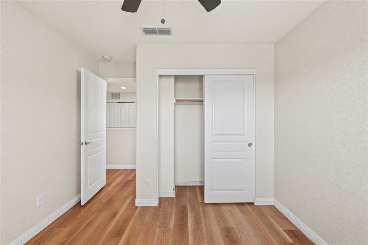 1000 Impressionist Loop Roseville, CA 95747 - Photo 27 of 33 a view of hallway with wooden floor