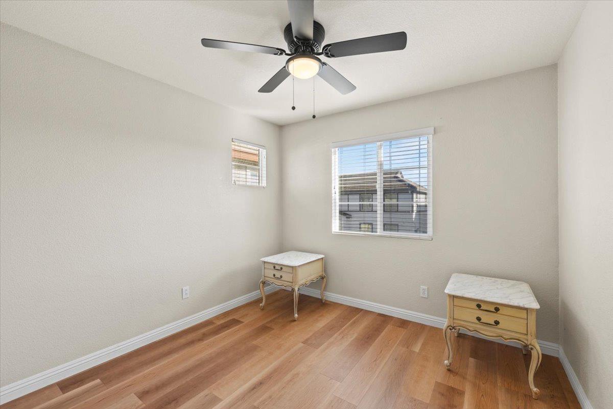 1000 Impressionist Loop Roseville, CA 95747 - Photo 28 of 33 a room with a wooden floor and a window