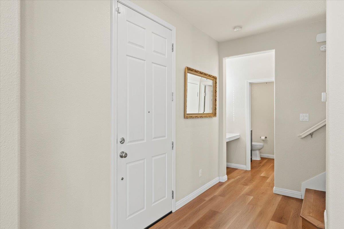 1000 Impressionist Loop Roseville, CA 95747 - Photo 32 of 33 a view of a room with wooden floor and a bathroom