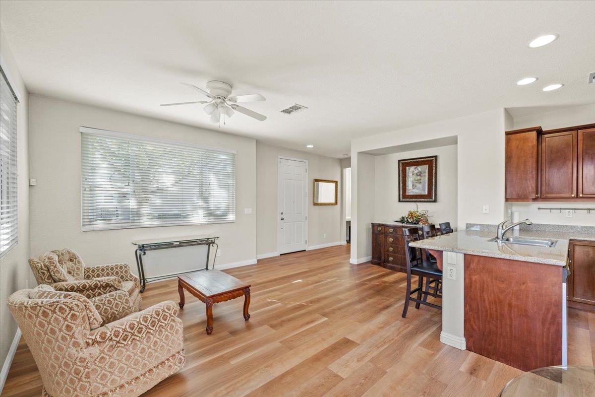 1000 Impressionist Loop Roseville, CA 95747 - Photo 4 of 33 a living room with furniture a window and a table