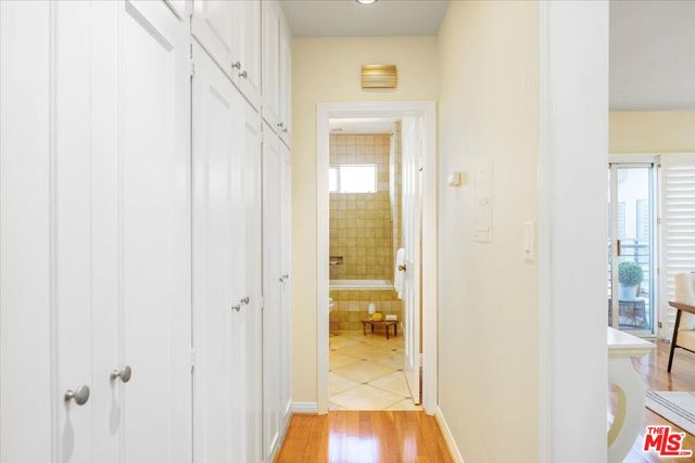 a view of a bathroom from a hallway