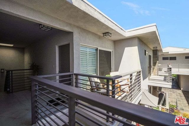 a kitchen with a sink and washing machine