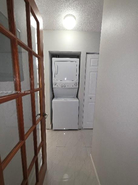 810 Southwest 129th Place, Unit 206 Miami, FL 33184 - Photo 11 of 16 a room with a washer and dryer