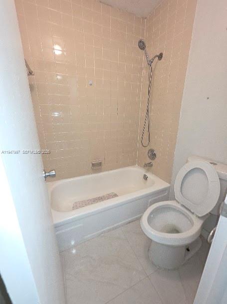 810 Southwest 129th Place, Unit 206 Miami, FL 33184 - Photo 13 of 16 a bathroom with a toilet a sink and a bathtub