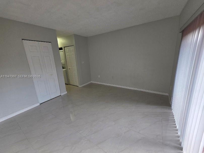 810 Southwest 129th Place, Unit 206 Miami, FL 33184 - Photo 15 of 16 an empty room with a empty space