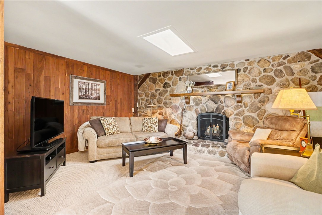 1722 Strong Road Victor, NY 14564 - Photo 6 of 33 Back area/ family room with woodburing fireplace t