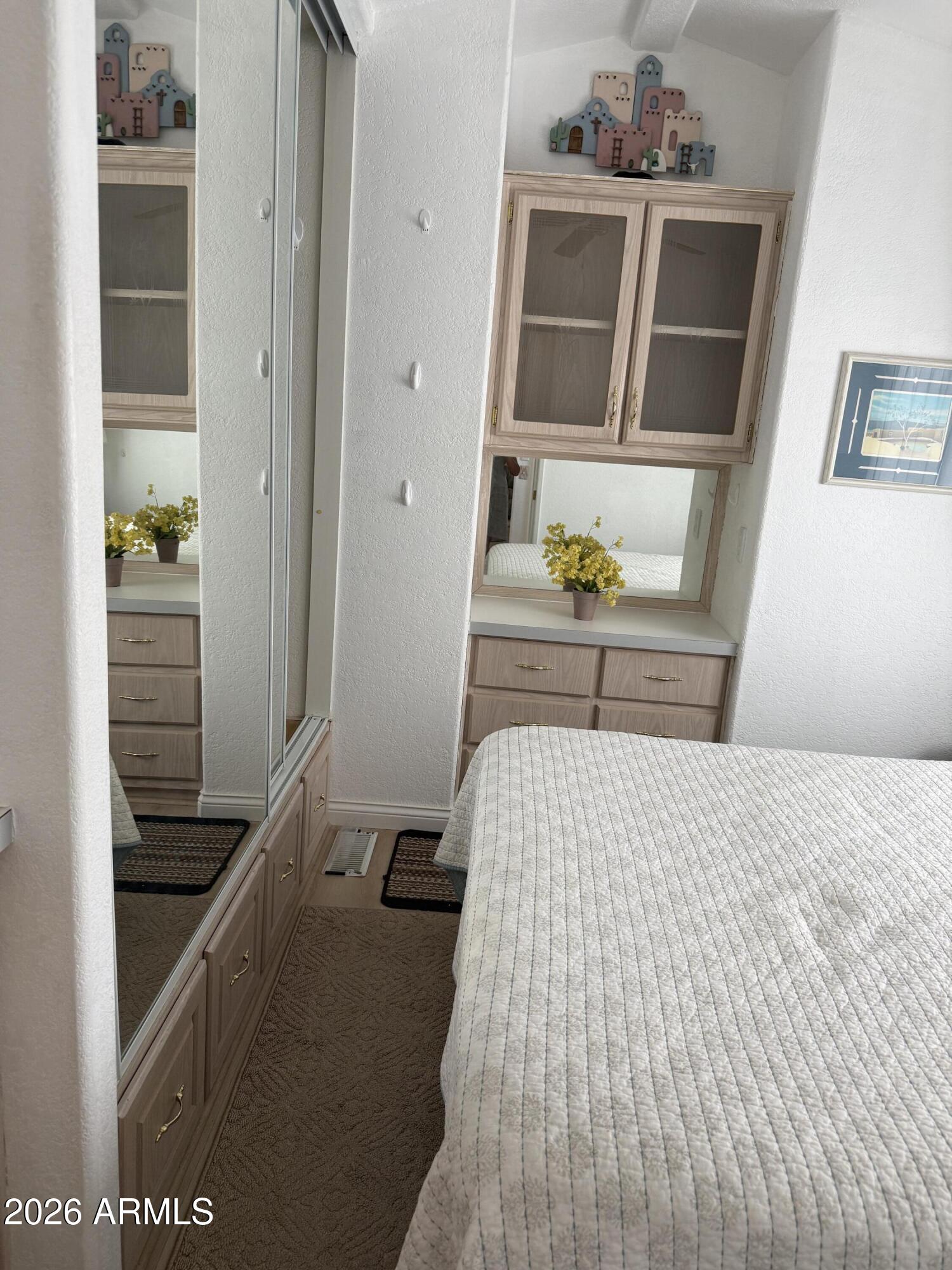21340 Trading Post Trail Congress, AZ 85332 - Photo 12 of 31 a bedroom with a bed and walk in closet