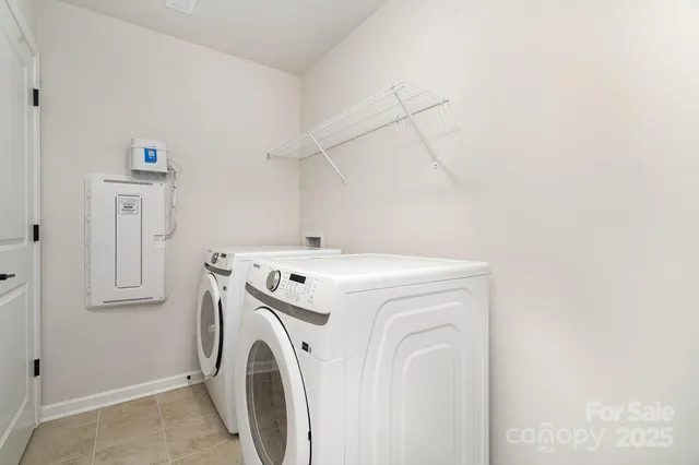 a view of a room with a window and a bathroom
