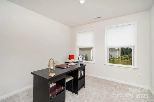 a view of a room with furniture