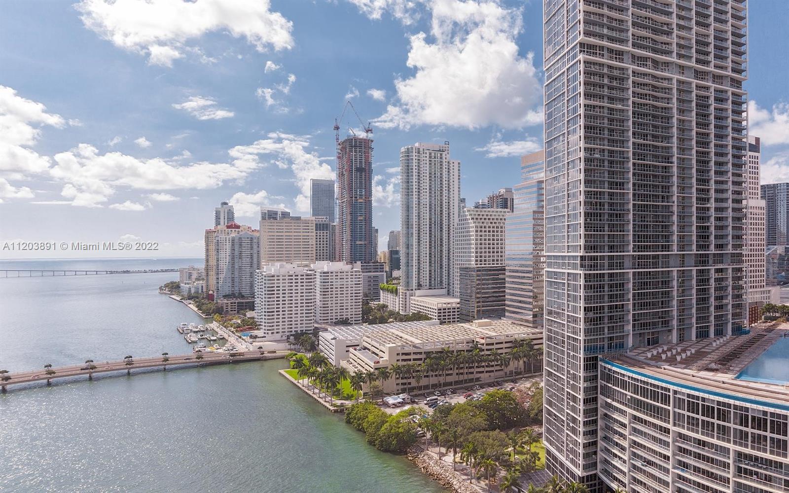 901 Brickell Key Boulevard, Unit 2503 Miami, FL 33131 - Photo 2 of 19 a view of a city with tall buildings