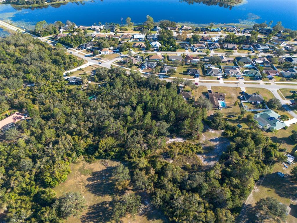 2078 Elkcam Boulevard Deltona, FL 32725 - Photo 14 of 36 an aerial view of multiple house