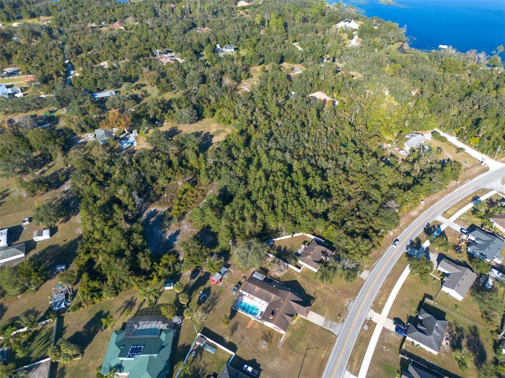 2078 Elkcam Boulevard Deltona, FL 32725 - Photo 20 of 36 an aerial view of a residential houses with yard