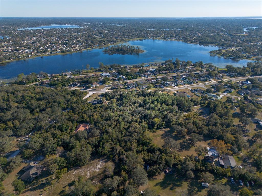 2078 Elkcam Boulevard Deltona, FL 32725 - Photo 32 of 36 an aerial view of multiple house