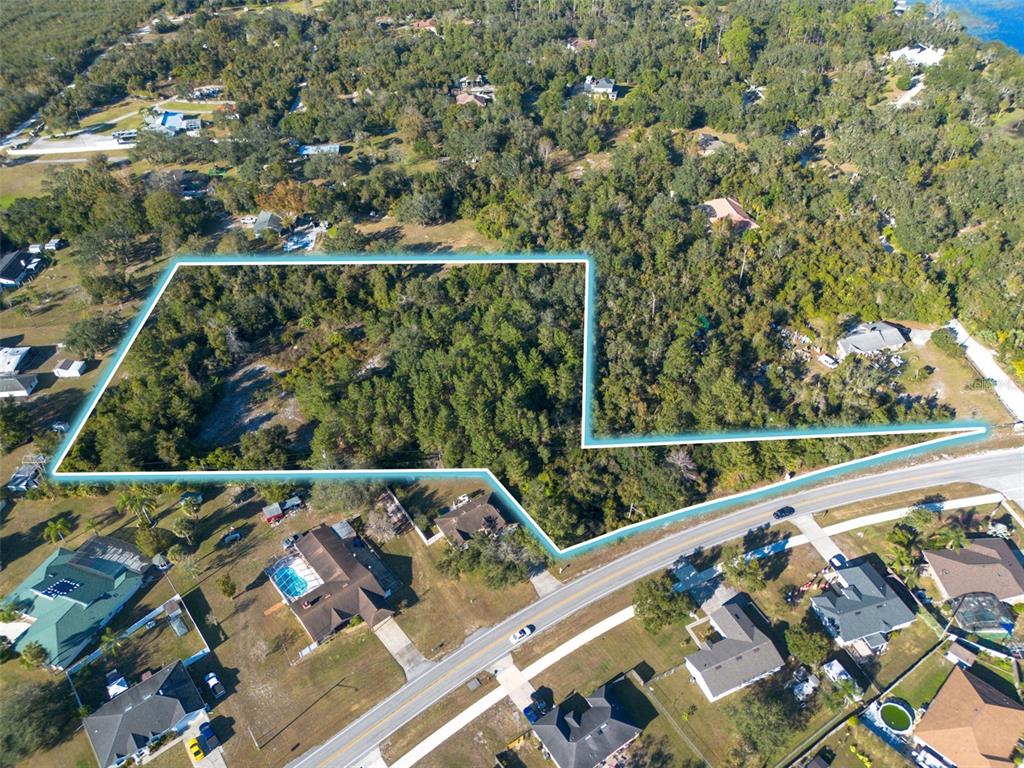 2078 Elkcam Boulevard Deltona, FL 32725 - Photo 5 of 36 a view of balcony with wooden floor