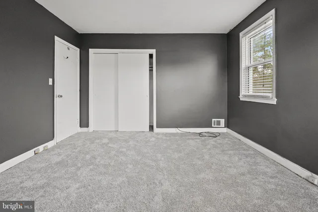 an empty room with a window