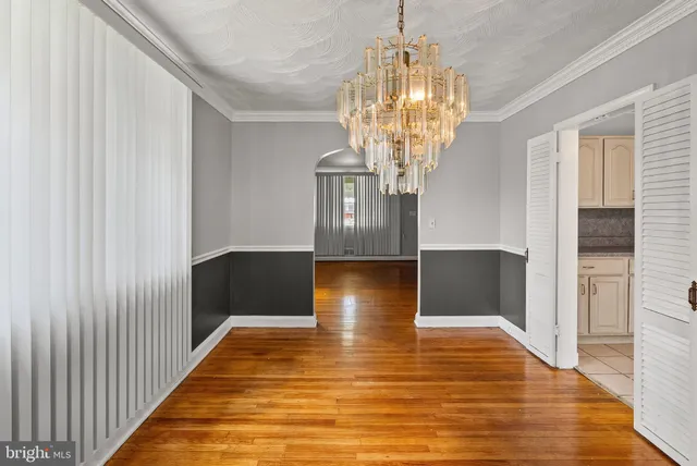 a kitchen with stainless steel appliances granite countertop a refrigerator sink and cabinets