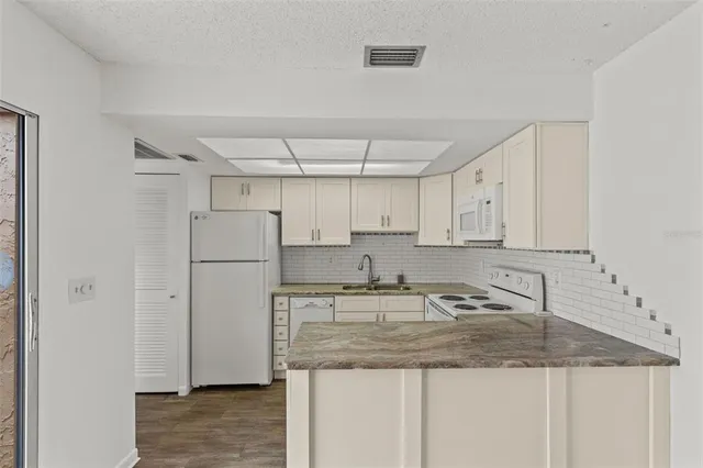 $189,900 | 1163 Orange Tree Circle West, Unit D, Palm Harbor, FL 34684