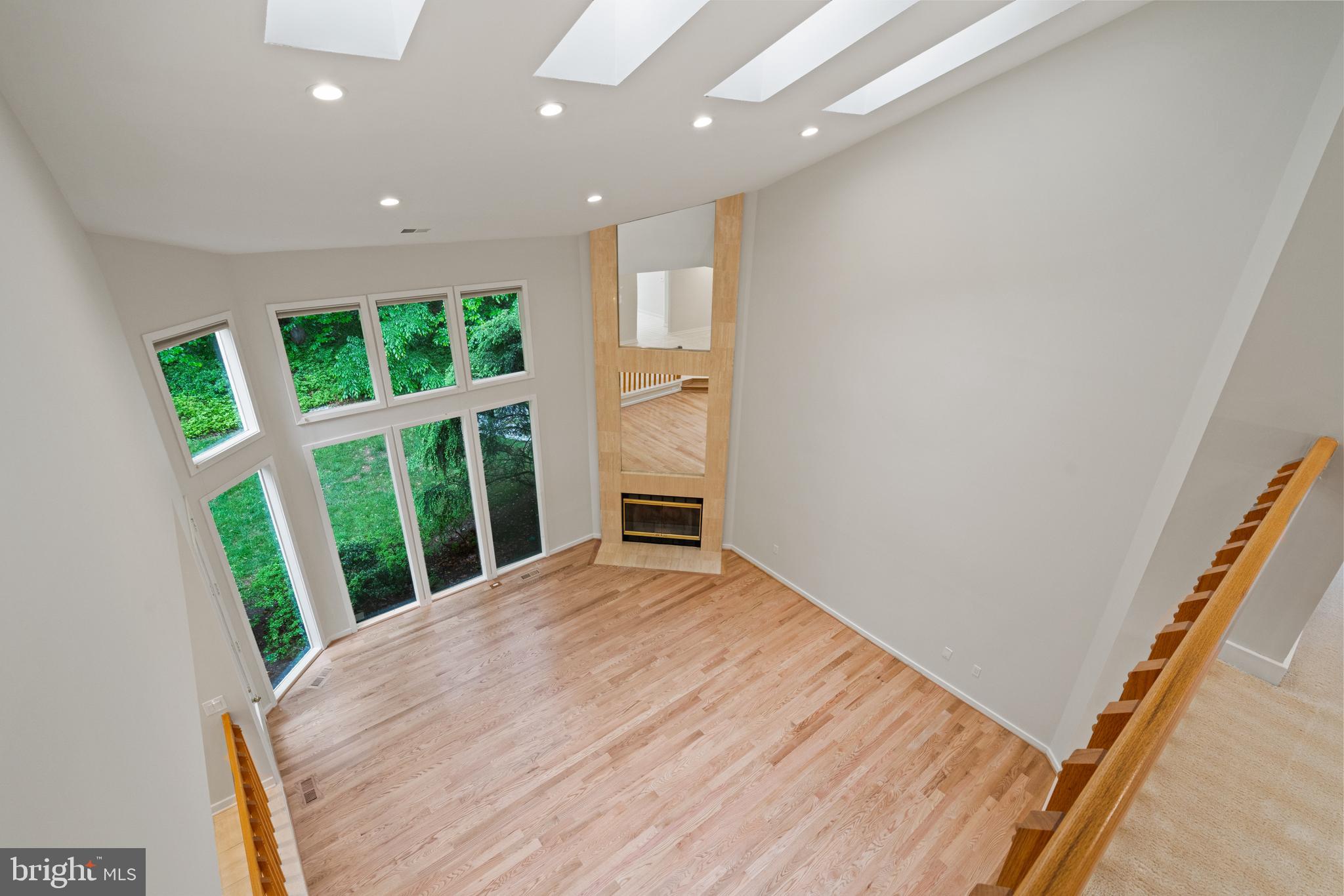 7805 Laurel Leaf Drive Potomac, MD 20854 - Photo 12 of 13 a view of an empty room with wooden floor and fence