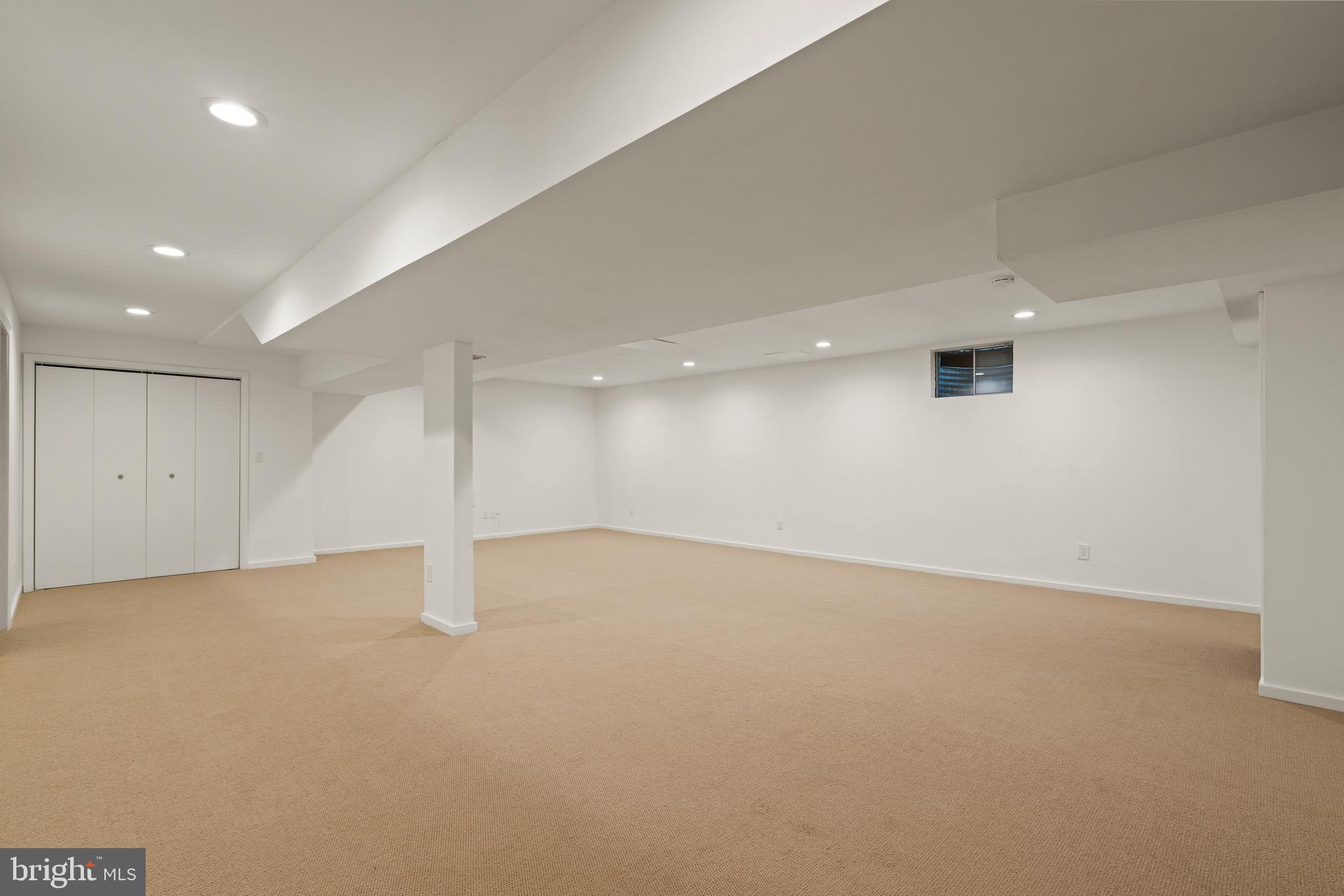7805 Laurel Leaf Drive Potomac, MD 20854 - Photo 13 of 13 an empty room with a empty space and windows