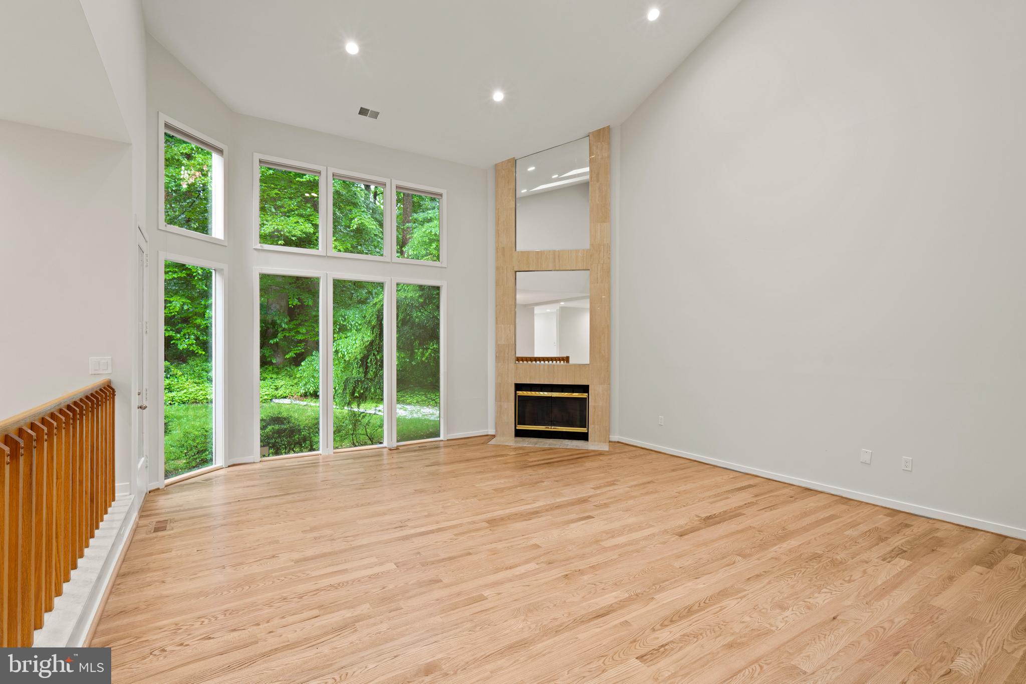 7805 Laurel Leaf Drive Potomac, MD 20854 - Photo 2 of 13 a view of an empty room with a window and kitchen view