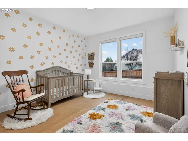 a bedroom with furniture and window