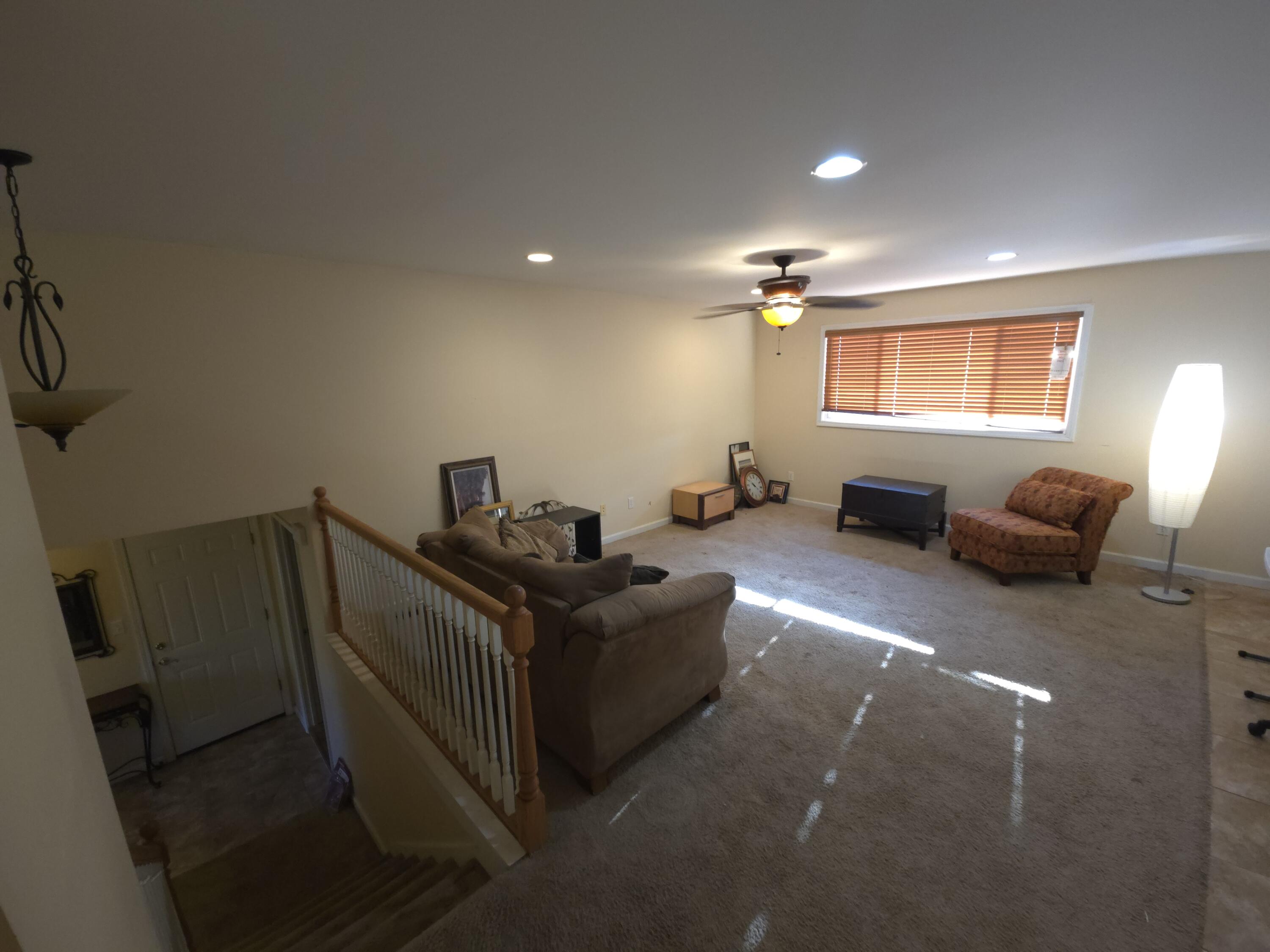 714 Governor Road Valparaiso, IN 46385 - Photo 2 of 15 a living room with furniture and a flat screen tv