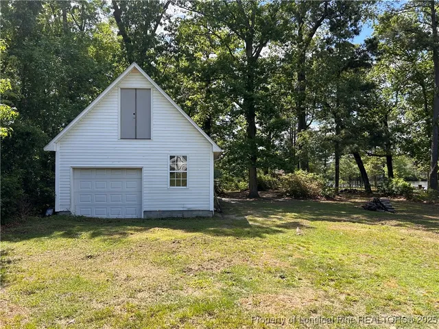 a view of a lake with a tree