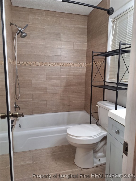 422 Lansdowne Road Fayetteville, NC 28314 - Photo 8 of 14 a white toilet sitting next to a bath tub and a shower