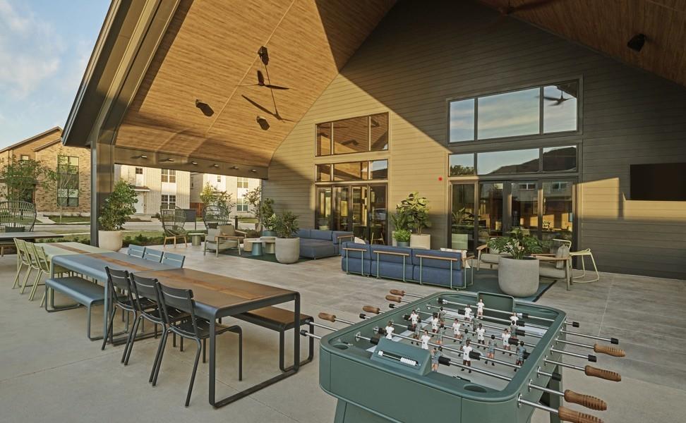 1525 Fm 982, Unit 1208 Princeton, TX 75407 - Photo 25 of 26 a living room with furniture and a floor to ceiling window