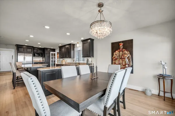 a view of kitchen and dining area with furniture