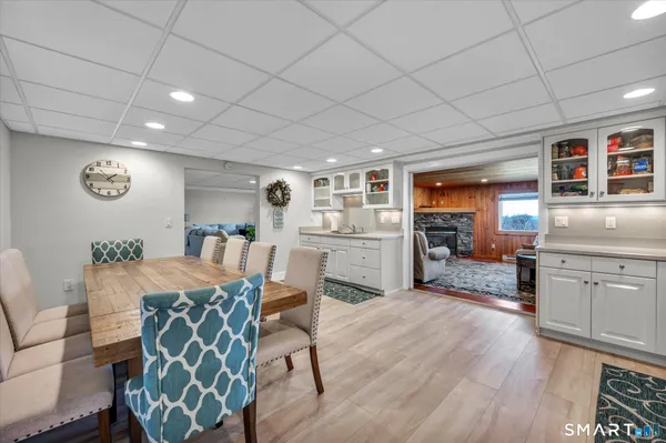 a kitchen with stainless steel appliances granite countertop a refrigerator sink and cabinets