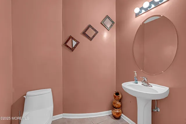 a kitchen with stainless steel appliances a sink and a refrigerator
