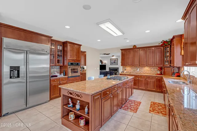 a view of livingroom with hardwood floor and ceiling fan