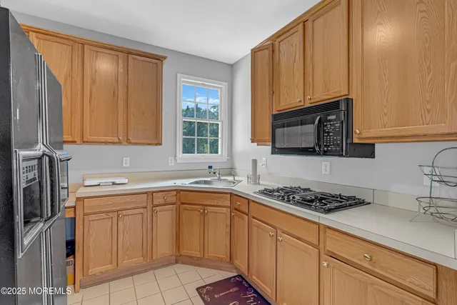 a bedroom with a bed and a desk