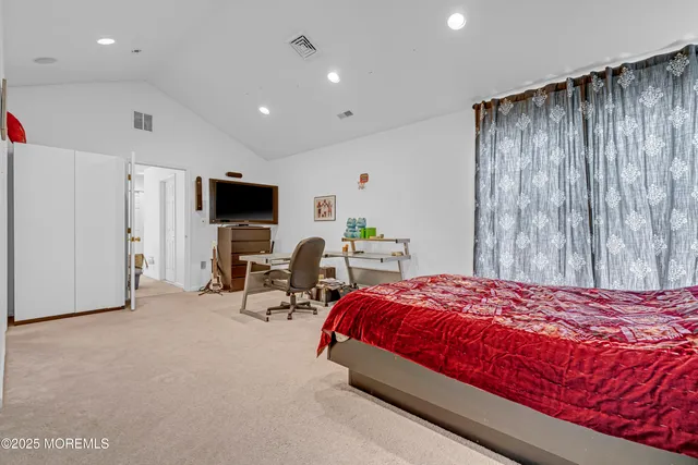 a very nice looking room with a large mirror