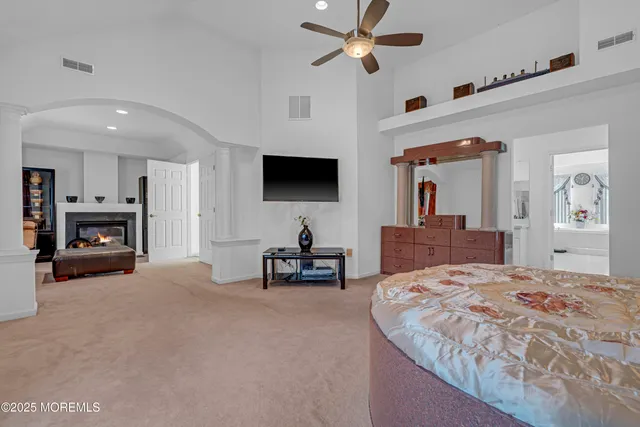 a view of yard with swimming pool and furniture