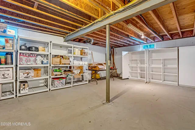 an aerial view of a house with outdoor space