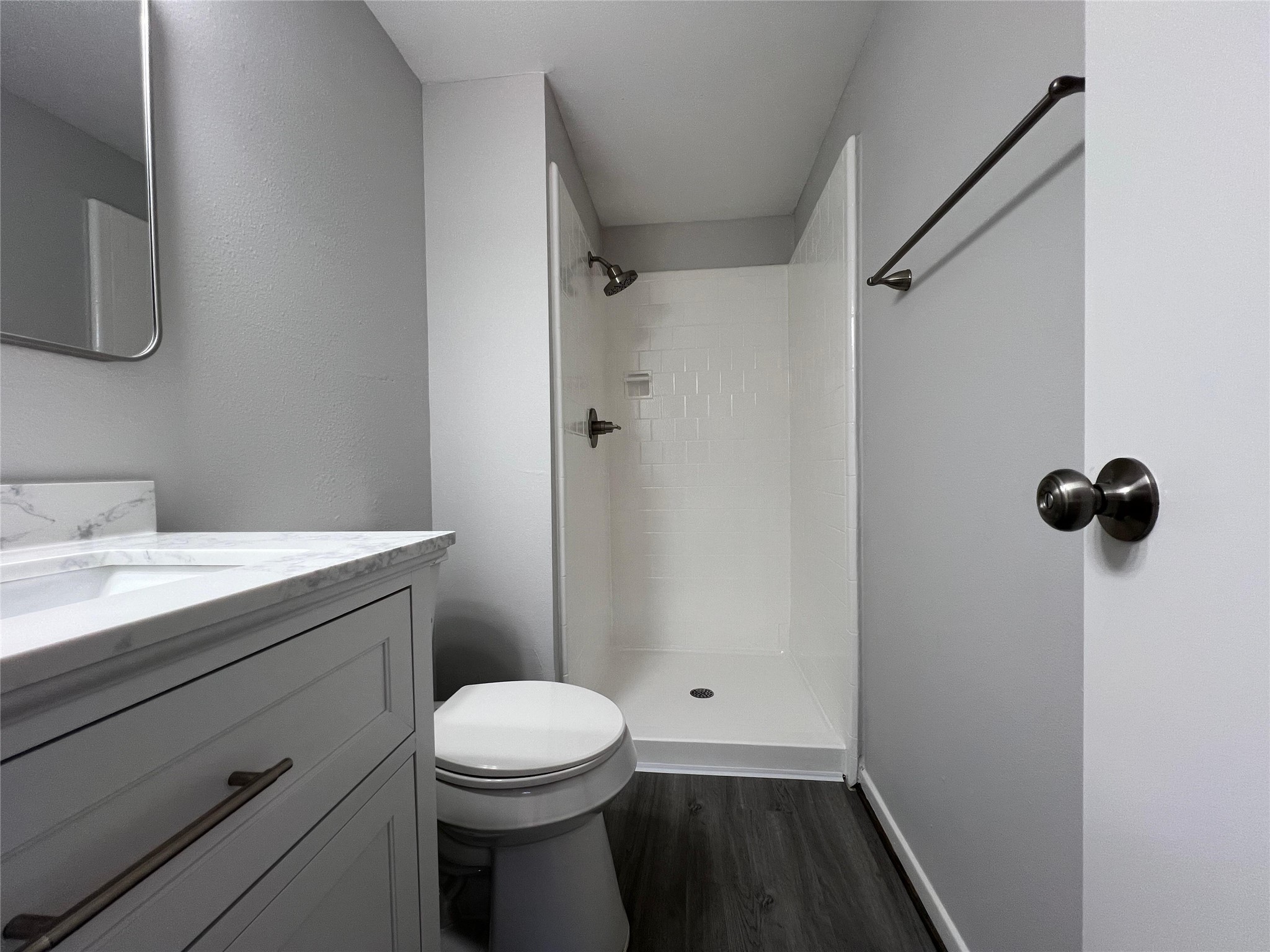 7012 Jetty Lane Houston, TX 77072 - Photo 22 of 24 a bathroom with a sink a toilet and shower