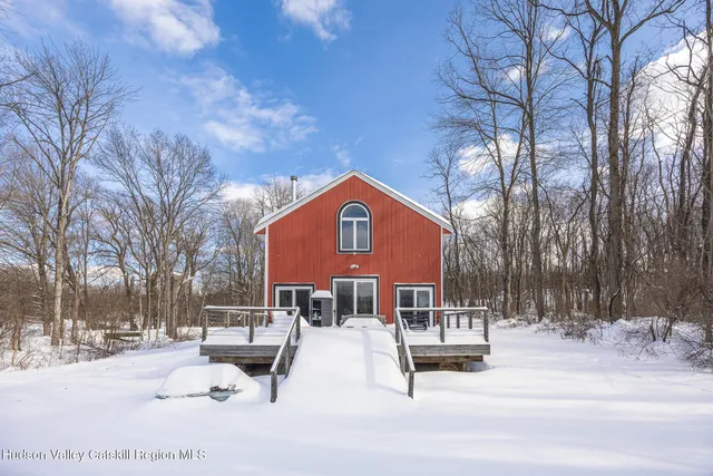 a roof view covered with tall trees