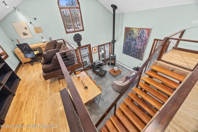 a living room with furniture and a rug