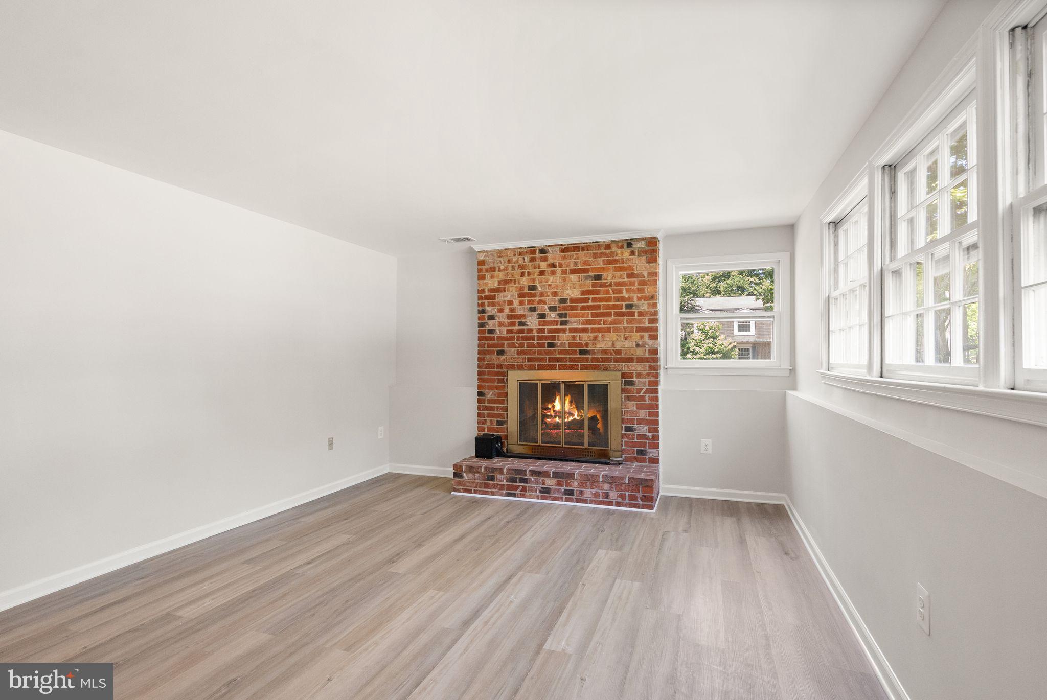 8803 Hayload Court Springfield, VA 22153 - Photo 33 of 49 Lower Level Rec Room w/ Wood Burning Fireplace