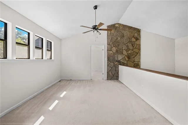 a view of a hallway with a chandelier
