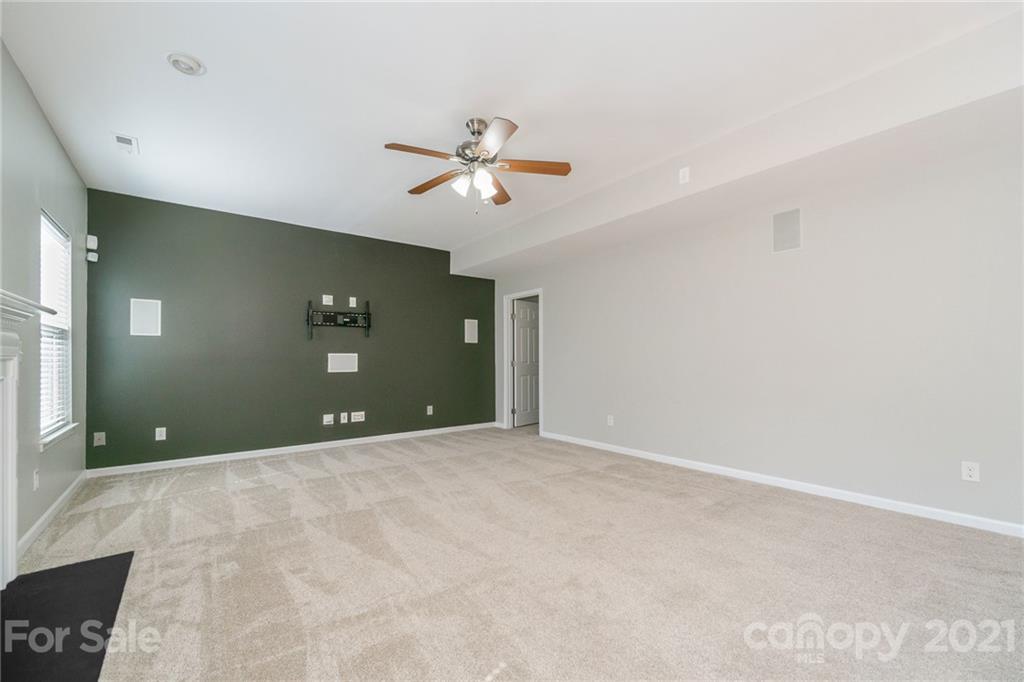 244 Lorraine Road Fort Mill, SC 29708 - Photo 13 of 33 a view of empty room with a ceiling fan