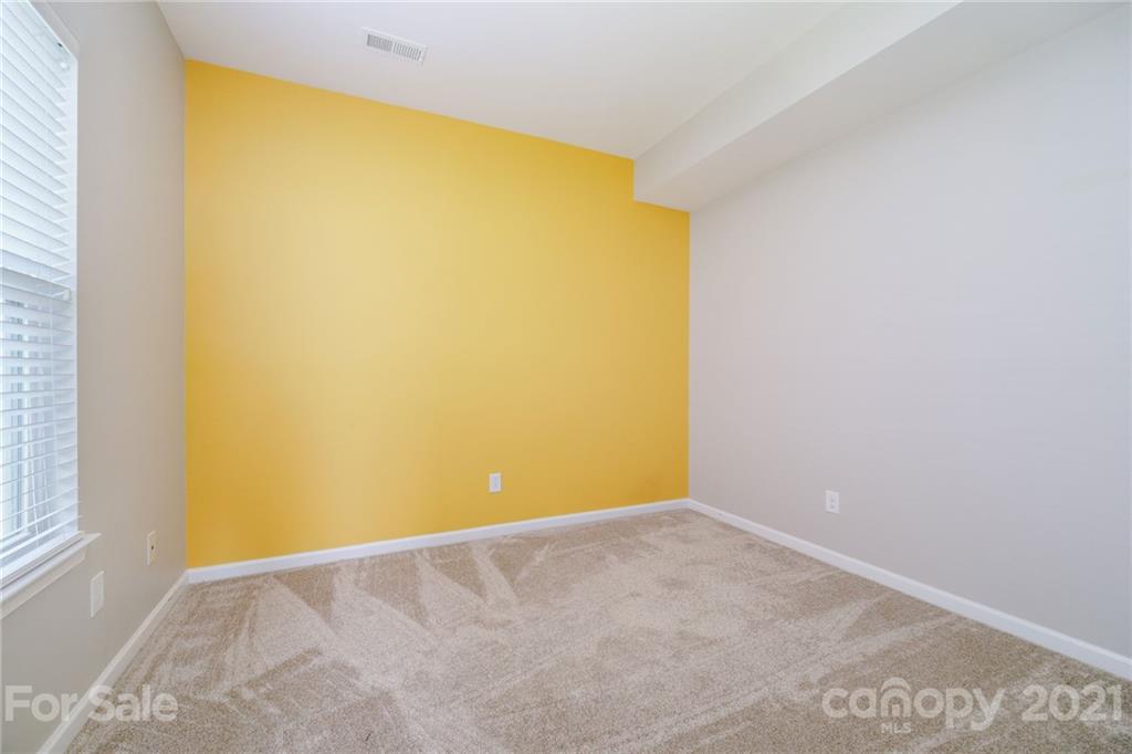 244 Lorraine Road Fort Mill, SC 29708 - Photo 14 of 33 a view of a big room with wooden floor and windows